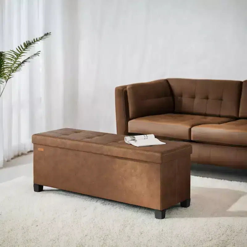 Storage Ottoman Bench with Legs, 15 x 43 x 15.7 Inches, 30 Gal. (112 L) Capacity, Synthetic Leather, Multi-Functional Footrest and Seat
