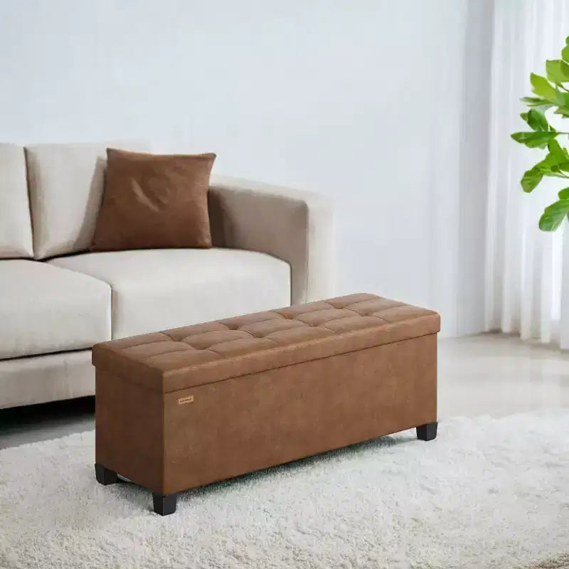 Storage Ottoman Bench with Legs, 15 x 43 x 15.7 Inches, 30 Gal. (112 L) Capacity, Synthetic Leather, Multi-Functional Footrest and Seat